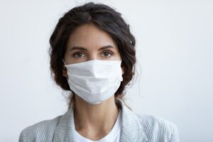 covid 19 constitute disability under ada, female wearing face mask